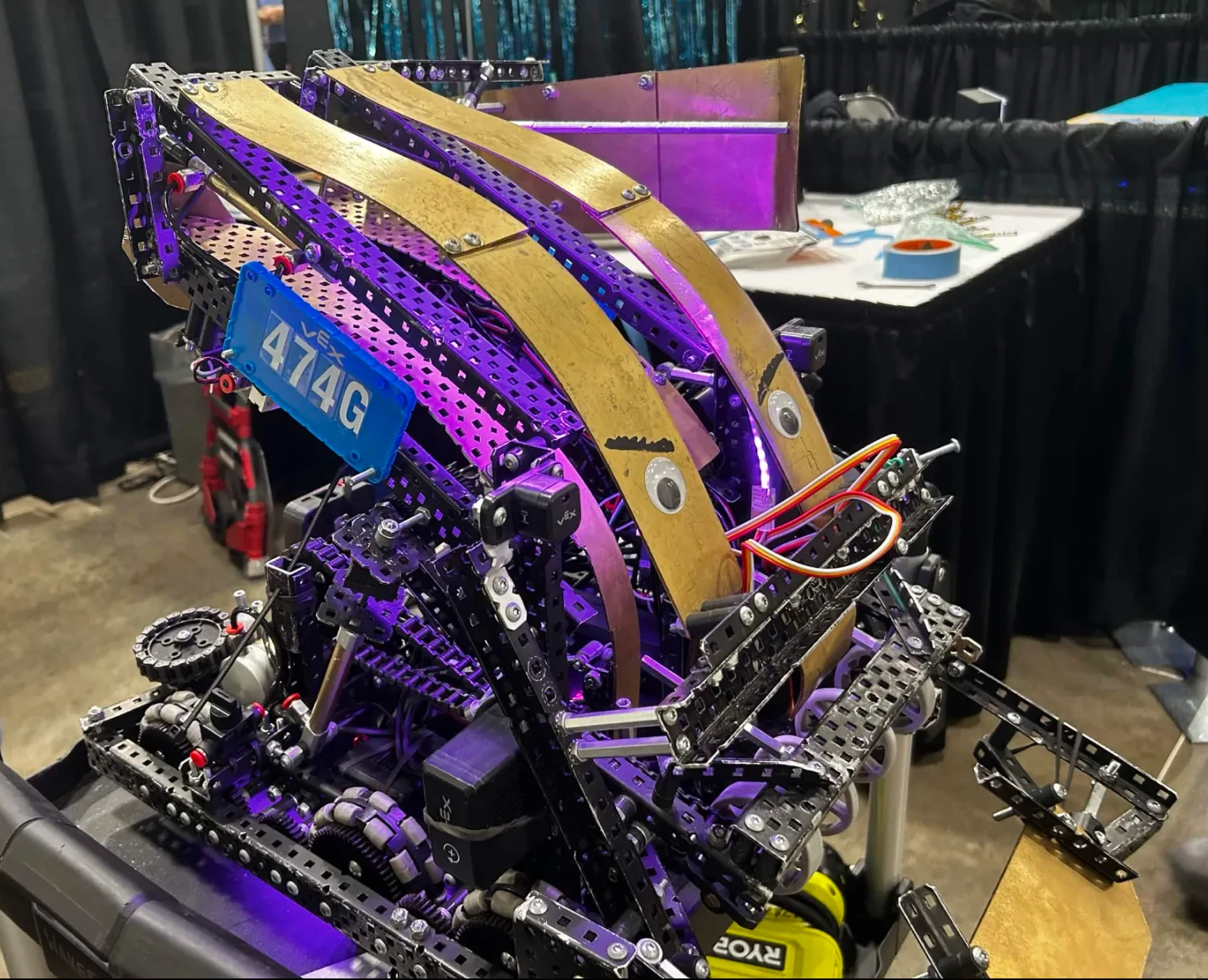 A VEX robot with purple underglow lighting